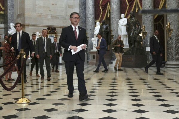 Speaker of the House Mike Johnson, R-La., arrives to discuss his proposal of sending crucial bipartisan support to aid Ukraine, Israel and Taiwan after weeks of inaction on Capitol Hill Wednesday, April 17, 2024, in Washington. (AP Photo/Mariam Zuhaib)