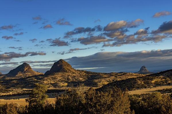 This photo provided by the Trust for Public Land shows the L Bar Ranch on Dec. 9, 2021 near Mount Taylor, adjacent to the Marquez State Wildlife Area, N.M. A national conservation group has acquired the sprawling ranch near a New Mexico mountain peak held sacred by Native American tribes. The Trust for Public Land announced Thursday, June 2, 2022 that land managers will be able create New Mexico's largest state-owned recreation property, near Mount Taylor. (Dave Cox/Mountain Media via AP)