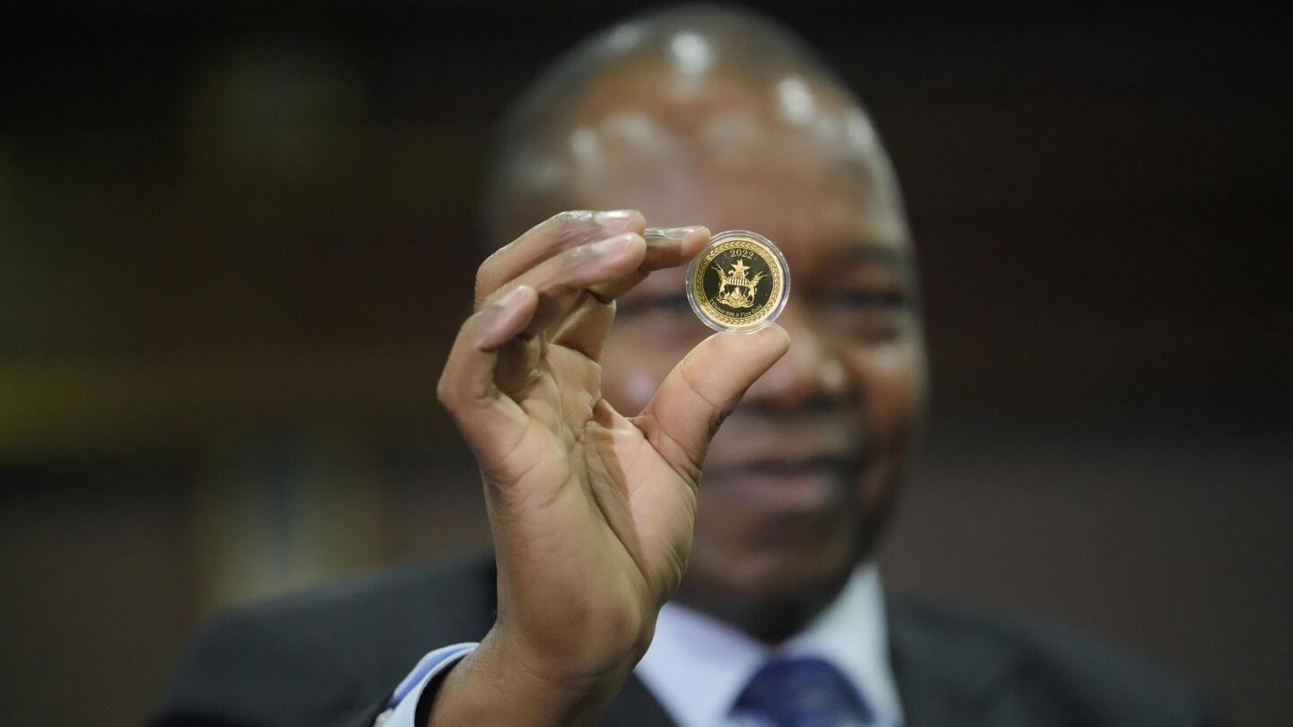 Zimbabwe plans to launch digital currency backed by gold | AP News
