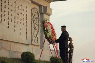 In this photo provided by the North Korean government, North Korean leader Kim Jong Un lays a wreath at Friendship Tower in Pyongyang, North Korea, Wednesday, July 28, 2021, a day after North Korea marked the 68th anniversary of the end of the Korean War. Independent journalists were not given access to cover the event depicted in this image distributed by the North Korean government. The content of this image is as provided and cannot be independently verified. Korean language watermark on image as provided by source reads: "KCNA" which is the abbreviation for Korean Central News Agency. (Korean Central News Agency/Korea News Service via AP)