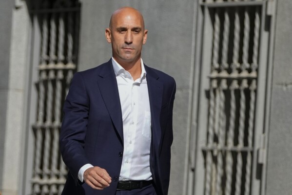 FILE - Former president of Spain's soccer federation Luis Rubiales arrives at the National Court in Madrid, Spain, Friday, Sept. 15, 2023. Spanish police detained former soccer federation president Luis Rubiales on his return to the country amid an ongoing corruption probe, Spain's Civil Guard said Wednesday, April 3, 2024. Rubiales was returning to Spain amid a judicial probe into the business deal to hold the Spanish Super Cup in Saudi Arabia. (AP Photo/Manu Fernandez, File)