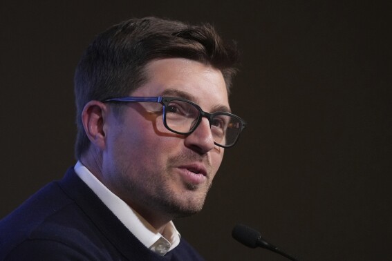 FILE - Then-Toronto Maple Leafs general manager Kyle Dubas speaks to media during an end-of-season availability in Toronto, on May 15, 2023. Dubas spent his first two months as the Pittsburgh Penguins director of hockey operations watching the staff around him adjust almost seamlessly to a new work environment. Dubas said he agreed to take on the additional role of general manager last week because he felt another new voice in the front office might be one too many. (Nathan Denette/The Canadian Press via AP, File)