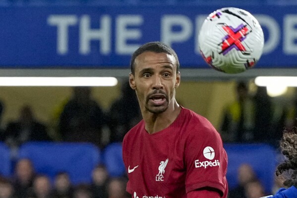 FILE - Liverpool's Joel Matip in action during the English Premier League soccer match between Chelsea and Liverpool at Stamford Bridge stadium in London, April 4, 2023. Joel Matip and Thiago Alcantara will leave Liverpool when their contracts expire at the end of the season. Liverpool announced their imminent departures on Friday ay 17, 2024, two days before the team’s final Premier League game. The 32-year-old Matip is a ball-playing center back who arrived at Anfield on a free transfer from Schalke in the offseason of 2016 as one of Klopp’s first signings. (AP Photo/Frank Augstein, File)