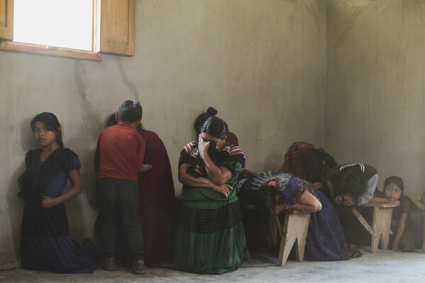 Indigenous women kneel in prayer during a memorial Mass honoring the late Pope Francis, in the Simojovel municipality, Mexico, April 27, 2025. (AP Photo/Isabel Mateos, File)
