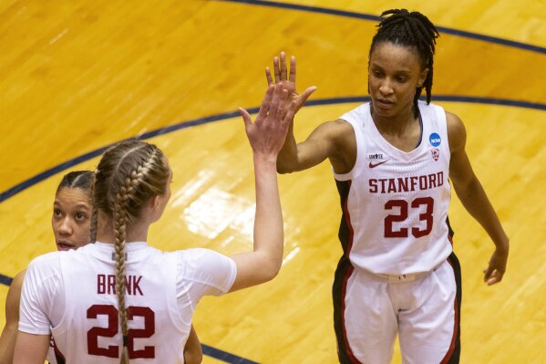 Stanford guard Kiana Williams (23) celebrates scoring against Oklahoma State with forward Cameron Brink (22) during the second half of a college basketball game in the second round of the NCAA women's tournament at the UTSA Convocation Center in San Antonio on Tuesday, March 23, 2021. (AP Photo/Stephen Spillman)