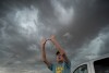 Retired National Weather Service forecaster David Imy gestures to an approaching storm during a Project ICECHIP operation Tuesday, June 3, 2025, near Tipton, Okla. (AP Photo/Carolyn Kaster)