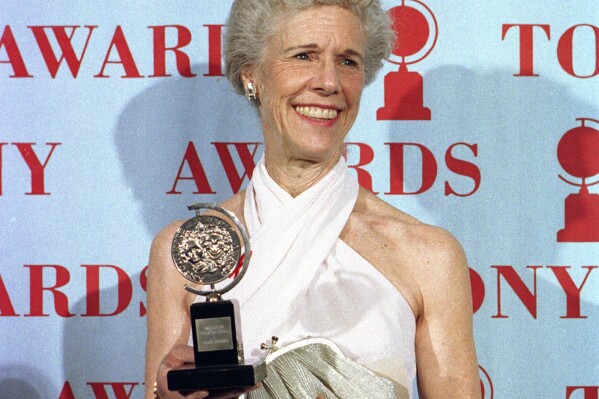 FILE - Actress Frances Sternhagen holds her award for best featured actress in a play for her performance in "The Heiress" during the Tony Awards in New York on June 4, 1995. Sternhagen, the veteran character actor who won two Tony Awards and became a familiar maternal face to TV viewers later in life in such shows as 鈥淐heers,鈥� 鈥淓R,鈥� 鈥淪ex and the City鈥� and 鈥淭he Closer,鈥� has died. She was 93. (AP Photo/Richard Drew, File)
