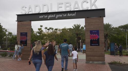 FILE - Congregants arrive at Saddleback Church in Lake Forest, Calif., on Sunday, Oct. 16, 2022. Saddleback Church is appealing its ouster from the Southern Baptist Convention for having women pastors on staff, according to the denomination. The Executive Committee of the nation’s largest Protestant denomination had voted to expel the church earlier this year. But the Southern California megachurch is exercising its right to appeal to the full annual meeting of the convention next month in New Orleans. Southern Baptists’ statement of faith says the office of pastor is limited to men. (AP Photo/Allison Dinner, File)