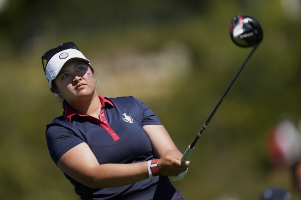 FILE - United States' Lilia Vu plays her tee shot on the 4th hole during her single match at the Solheim Cup golf tournament in Finca Cortesin, near Casares, southern Spain, Sunday, Sept. 24, 2023. Europe play the United States in this biannual women's golf tournament, which played alternately in Europe and the United States. (AP Photo/Bernat Armangue, File)