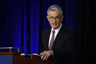 FILE - In this June 2, 2019, file photo Federal Reserve Chairman Jerome Powell speaks at a conference involving its review of its interest-rate policy strategy and communications in Chicago. On Wednesday, June 19, the Federal Reserve releases its latest monetary policy statement and updated economic projections. (AP Photo/Kiichiro Sato, File)