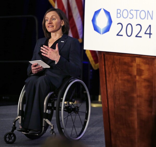 Cheri Blauwet, co-chair of the Boston 2024 Olympic and Paralympic Movement Committee, addresses reporters during a news conference by organizers of Boston's campaign for the 2024 Summer Olympics in Boston, Jan. 21, 2015. (AP Photo/Charles Krupa, File)