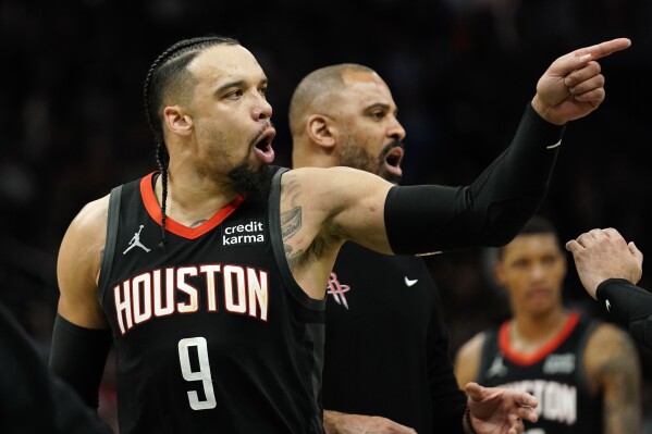 Houston Rockets' Dillon Brooks (9) yells to an official after being ejected during the second half of an NBA basketball game against the Milwaukee Bucks, Sunday, Dec. 17, 2023, in Milwaukee. (AP Photo/Aaron Gash)