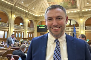 FILE - South Dakota Republican Rep. Jon Hansen poses in the House of Representatives in the state Capitol in Pierre, S.D., on Wednesday, Feb. 21, 2024. Hansen sponsored a bill Gov. Kristi Noem signed on Friday, March 15, 2024, that allows signers of initiative petitions to withdraw their signatures. (AP Photo/Jack Dura, File)