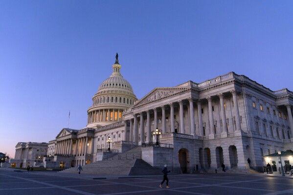 FILE - The U.S. Capitol is seen at sunrise, Feb. 7, 2024, in Washington. The Senate has passed an emergency spending package that would provide military aid to Ukraine and Israel, replenish U.S. weapons systems and provide food, water and other humanitarian aid to civilians in Gaza. (AP Photo/Jose Luis Magana, FIle)