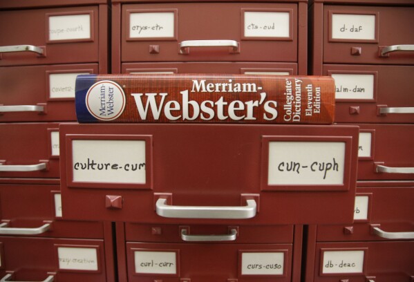 FILE - A Merriam-Webster dictionary sits atop their citation files at the dictionary publisher's offices on Dec. 9, 2014, in Springfield, Mass. Merriam-Webster's word of the year for 2023 is 鈥渁uthentic.鈥� (APPhoto/Stephan Savoia, File)