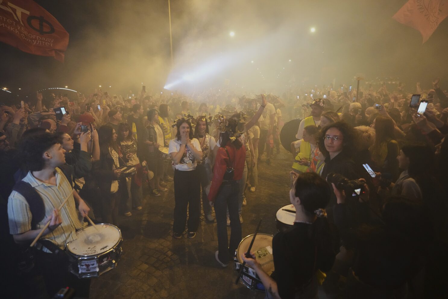 Fireworks as thousands greet Serbian students who cycled to France seeking EU support for protests