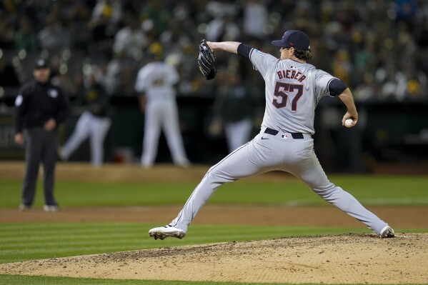 Cleveland Guardians pitcher Shane Bieber throws to an Oakland Athletics batter during the sixth inning of a baseball game Thursday, March 28, 2024, in Oakland, Calif. (AP Photo/Godofredo A. Vásquez)