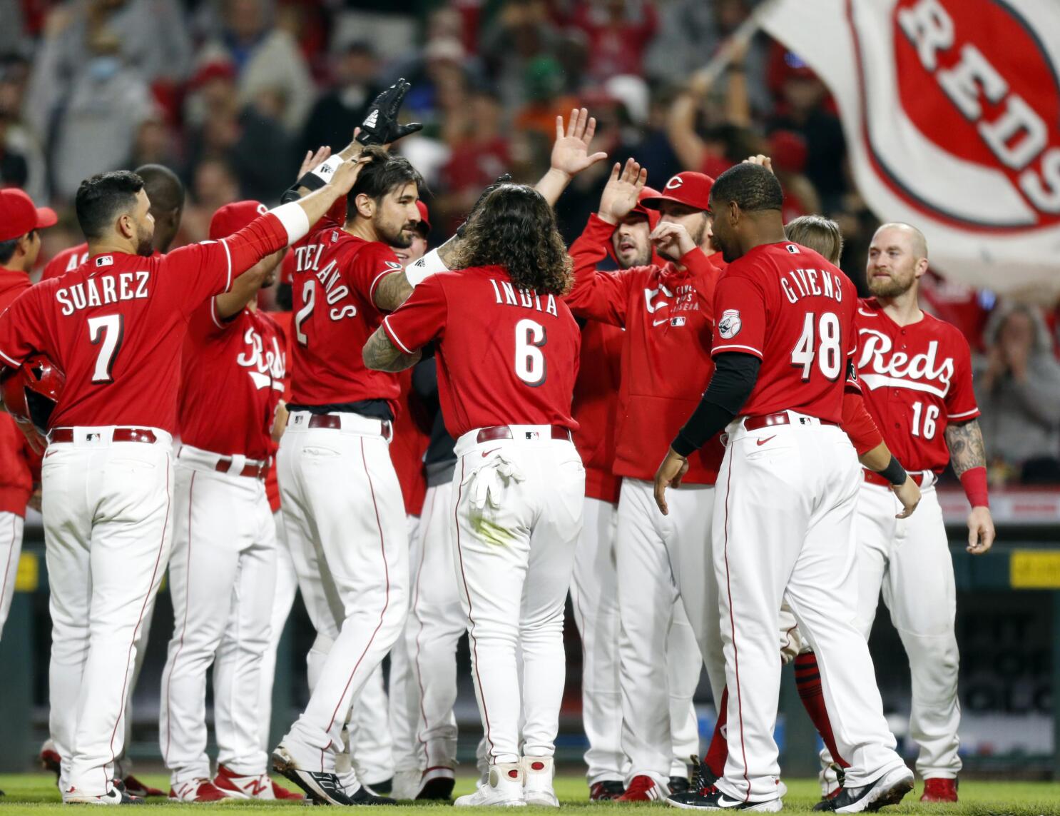 Nick Castellanos homered, bat checked in Reds win