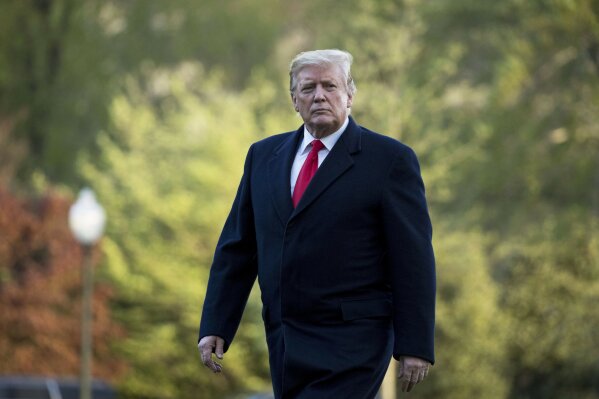 
              FILE - In this April 15, 2019, file photo, President Donald Trump walks on the South Lawn as he arrives at the White House in Washington.  Trump on Tuesday vetoed a bill passed by Congress to end U.S. military assistance in Saudi Arabia's war in Yemen. (AP Photo/Andrew Harnik, File)
            