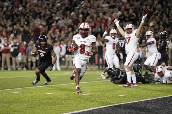 Miami-Ohio defeats Cincinnati 31-24 in OT, breaking a 16-game losing streak  in the series