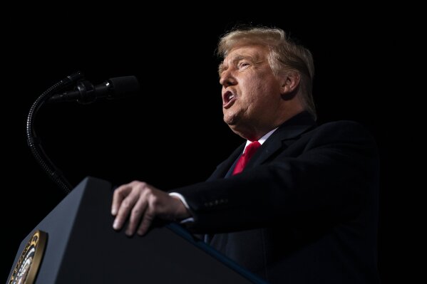 President Donald Trump speaks at a campaign rally at Erie International Airport, Tom Ridge Field, Tuesday, Oct. 20, 2020, in Erie, Pa. (AP Photo/Evan Vucci)
