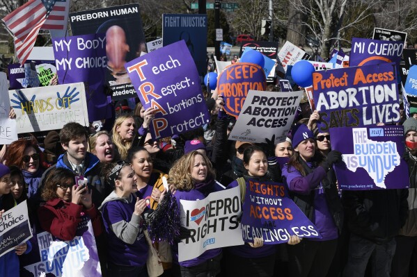 Pro-abortion rights protesters rally outside the Supreme Court in Washington, Wednesday, March 2, 2016. (AP Photo/Susan Walsh, File)