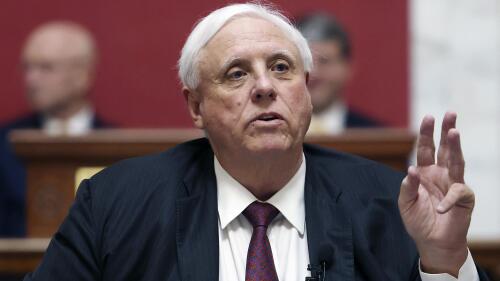 FILE - West Virginia Gov. Jim Justice delivers his annual State of the State address in the House Chambers at the West Virginia Capitol, Jan. 11, 2023, in Charleston, W.Va. The federal government filed a lawsuit on Tuesday, May 30, against coal mines owned by the family of Justice seeking payment of unpaid penalties for previous mining law violations. (AP Photo/Chris Jackson, File)