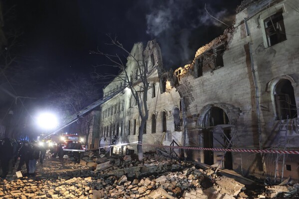 In this photo provided by the Kharkiv Regional Administration, an apartment building damaged in a Russian rocket attack is seen in Kharkiv, Ukraine, in the early hours of Wednesday, Jan. 17, 2024. (Kharkiv Regional Administration via 麻豆传媒app)