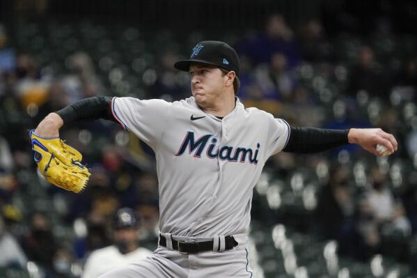 Dickerson leads way as Marlins beat Burnes, Brewers 8-0