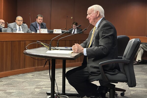 FILE - Georgia Senate Ethics Committee Chairman Max Burns, R-Sylvania, explains a bill to the committee, Jan. 23, 2024, at the Georgia Capitol in Atlanta. Burns is pushing for changes to how Georgia governs challenges to a voter's eligibilty in the closing days of the 2024 Georgia legislative sessions. (AP Photo/Jeff Amy, file)