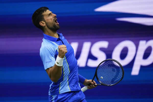 Novak Djokovic, of Serbia, reacts during a match against Laslo Djere, of Serbia, during the third round of the U.S. Open tennis championships, Saturday, Sept. 2, 2023, in New York. (AP Photo/Frank Franklin II)