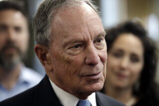 
              FILE - In this Jan. 29, 2019 file photo, Michael Bloomberg speaks to workers during a tour of the WH Bagshaw Company, a pin and precision component manufacturer, in Nashua, N.H. Bloo...