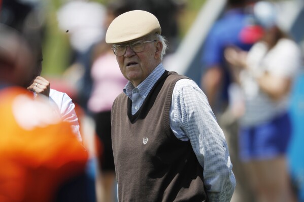 FILE - Retired Denver Broncos defensive coordinator Joe Collier watches drills at the NFL football team's training facility June 5, 2019, in Englewood, Colo. Collier, the former Buffalo Bills coach and architect of the Broncos' famed “Orange Crush” defense, has died at age 91. The Broncos said Collier died at his Littleton, Colo., home Monday night, May 6. (AP Photo/David Zalubowski, File)