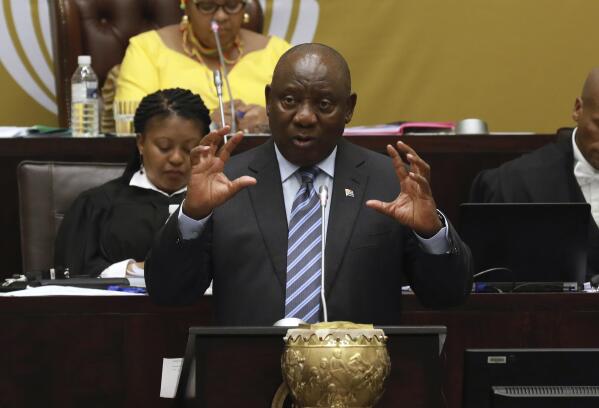 FILE — South African President Cyril Ramaphosa responds to questions in Parliament Cape Town, South Africa, Thursday, Sept. 29, 2022 where he denied allegations of money laundering while being questioned over a scandal that threatens his position and the direction of Africa's most developed economy. Ramaphosa is facing serious calls to step down after a parliamentary probe found he may have breached the country's anti-corruption laws related to the theft of millions of dollars at his Phala Phala game farm. (AP Photo/Nardus Engelbrecht/File)
