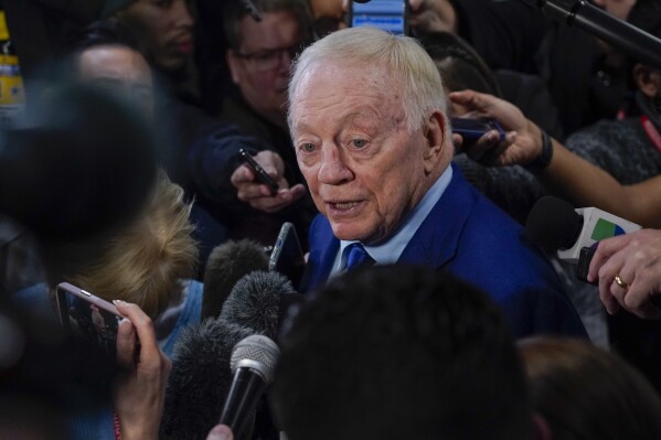 Dallas Cowboys owner Jerry Jones speaks to reporters following an NFL football game between the Cowboys and the Green Bay Packers, Sunday, Jan. 14, 2024, in Arlington, Texas. The Packers won 48-32. (AP Photo/Sam Hodde)