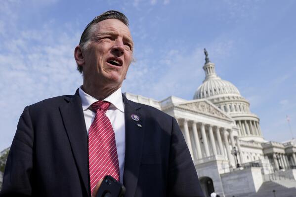 FILE - Rep. Paul Gosar, R-Ariz., waits for a news conference at the Capitol in Washington, on July 22, 2021. An Arizona judge has ordered three Republicans, including secretary of state nominee Mark Finchem and Gosar, to pay $75,000 in attorney fees for filing a defamation suit against a former Democratic lawmaker “primarily for purposes of harassment.” (AP Photo/J. Scott Applewhite, File)