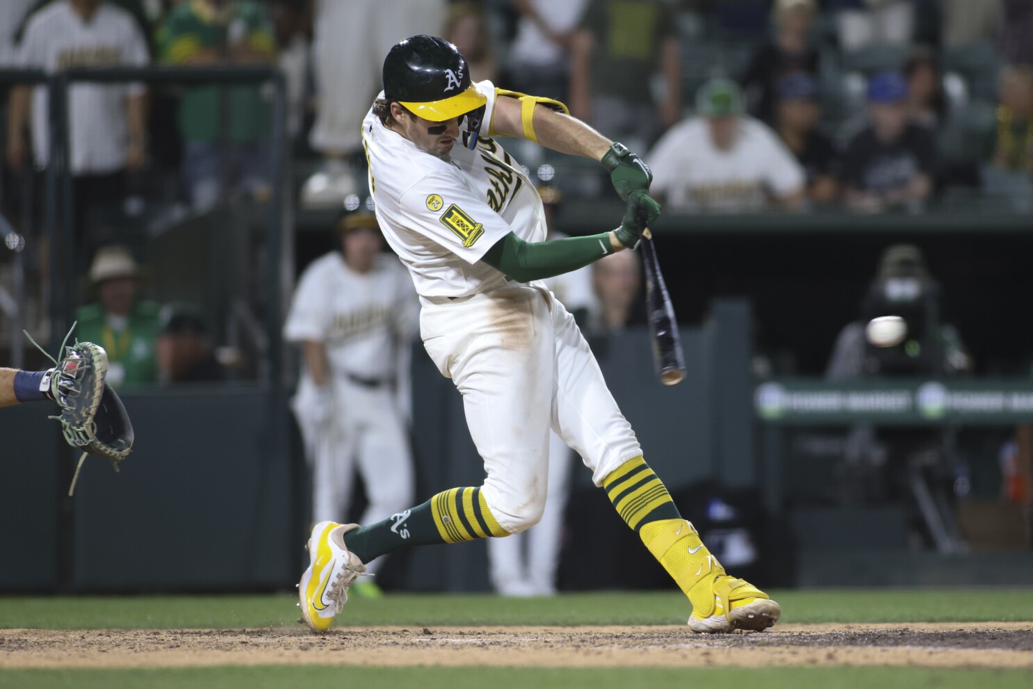 Wilson comes up clutch again as Athletics edge Mariners 7-6 in 11 innings
