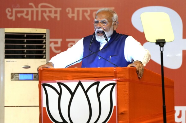 Prime Minister Narendra Modi addresses supporters at the Bharatiya Janata Party (BJP) headquarters in New Delhi, India, Tuesday, June 4, 2024. (AP Photo/Manish Swarup)