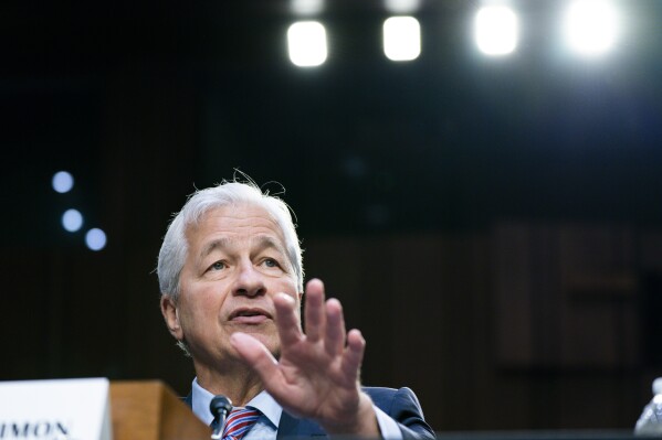 FILE - JPMorgan Chase & Company Chairman and CEO Jamie Dimon testifies at a Senate Banking Committee annual Wall Street oversight hearing, Thursday, Sept. 22, 2022, on Capitol Hill in Washington. JPMorgan Chase’s third-quarter profit soared 35% from last year, fueled by a rapid rise in interest rates, but Dimon, issued a sobering statement about the current state of world affairs and economic instability, Friday, Oct. 13, 2023. (AP Photo/Jacquelyn Martin, File)