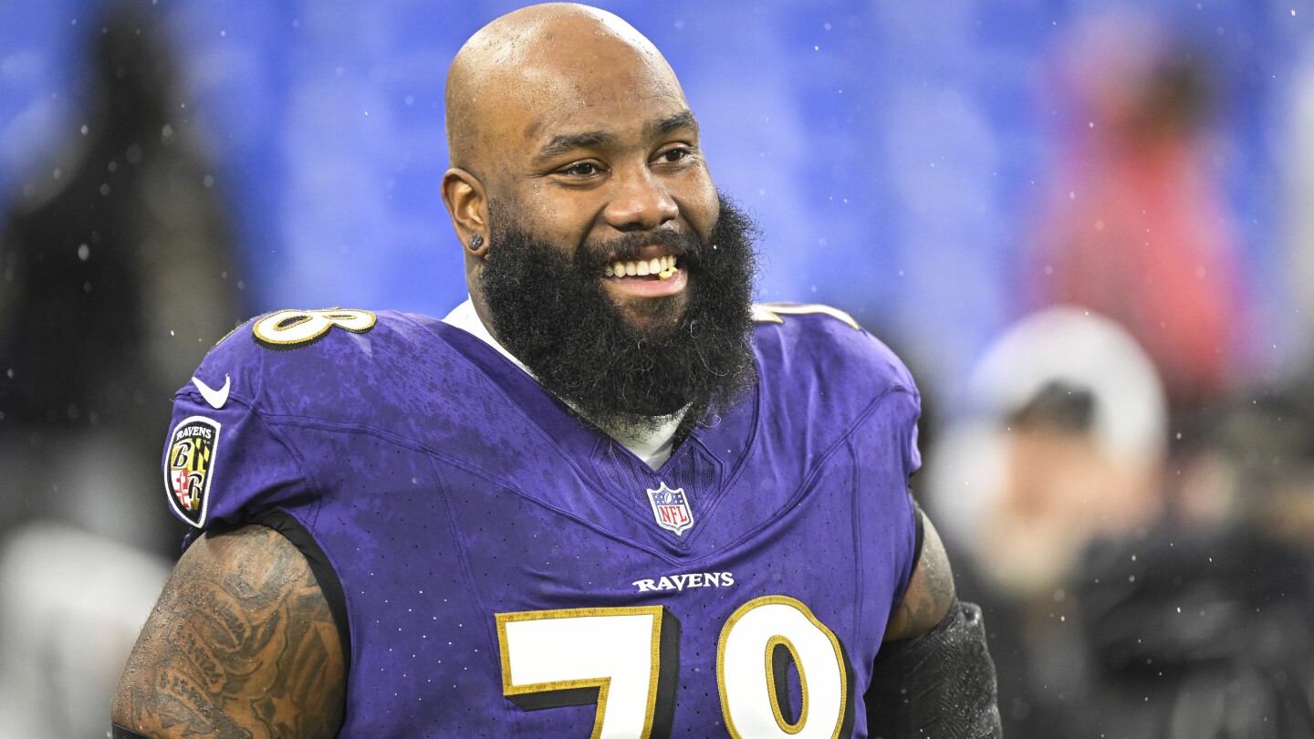 Jets acquiring offensive tackle Morgan Moses from Ravens in deal that includes picks, AP source says | AP News
