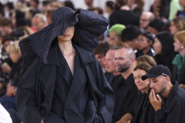 A model wears a creation for the Issey Miyake Spring/Summer 2024 womenswear fashion collection presented Friday, Sept. 29, 2023 in Paris. (AP Photo/Vianney Le Caer)