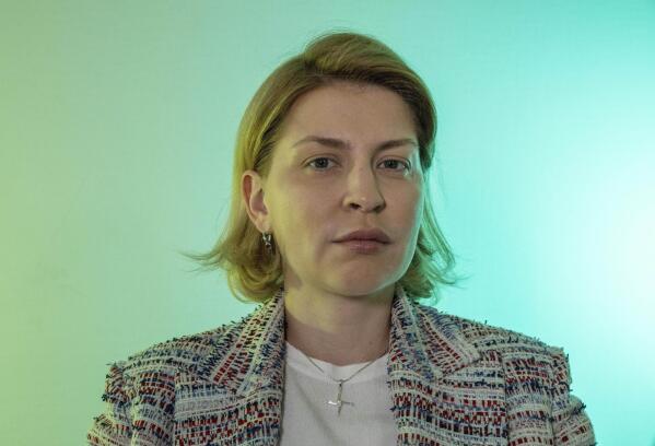 Deputy Prime Minister for European and Euro-Atlantic Integration Olha Stefanishyna, after an interview with The Associated Press, in Kyiv, Ukraine, Wednesday, June 22, 2022. Stefanishyna said Wednesday that she’s “100%” certain that all 27 EU members will imminently green-light granting Ukraine the coveted status of candidate to join the bloc. Ukrainian President Volodymyr Zelenskyy expressed similar optimism, calling it a “crucial moment” for Ukraine. (AP Photo/Nariman El-Mofty)