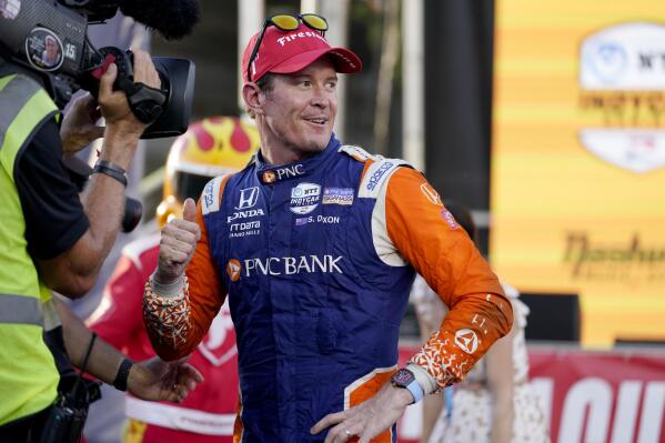 FILE - Scott Dixon celebrates after winning the IndyCar Music City Grand Prix auto race, Aug. 7, 2022, in Nashville, Tenn. Dixon knows IndyCar’s tightest championship race in nearly 20 years would have probably been long decided if not for a rare gaffe by The Iceman in the Indianapolis 500. Dixon was the dominant car at Indianapolis in May and led 95 laps until a late speeding penalty took the New Zealander out of contention. (AP Photo/Mark Humphrey, File)