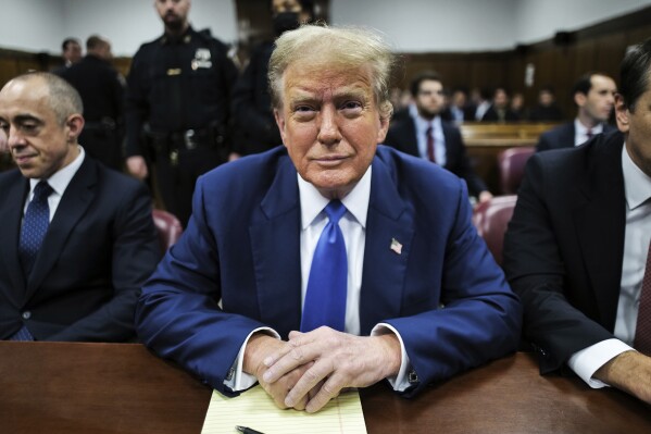 Former President Donald Trump appears at Manhattan criminal court before his trial in New York, Friday, May 3, 2024. (Charly Triballeau/Pool Photo via AP)