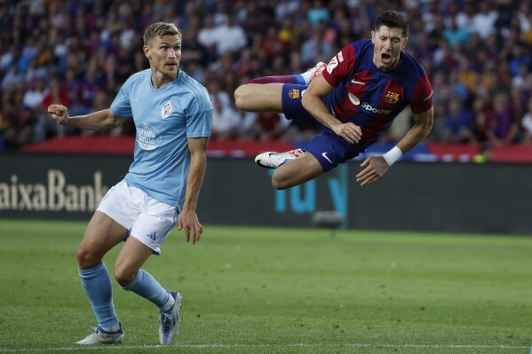 Lewandowski, Cancelo lead Barcelona to 3-2 comeback win over Celta with 3  goals in final 10 minutes