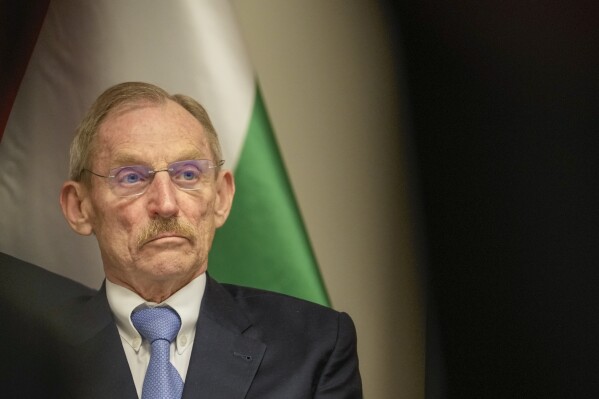 Hungarian Interior Minister Sandor Pinter attends a press conference after a meeting of Interior Ministers of Visegrad Group (Czech Republic, Hungary, Poland, and Slovakia), Austria and Germany, in Szeged, Hungary, Monday, Nov. 27, 2023. (AP Photo/Darko Vojinovic)