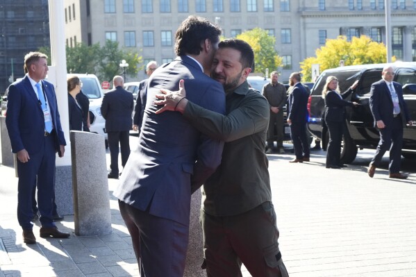 Prime Minister Justin Trudeau hugs Ukrainian President Volodymyr Zelenskyy as he arrives on Parliament Hill in Ottawa on Friday, Sept. 22, 2023. (Sean Kilpatrick /The Canadian Press via AP)