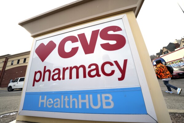 FILE - A CVS store sign is displayed in Pittsburgh on Feb. 3, 2023. CVS Health said Monday, Feb. 5, 2024 that it has reached an agreement to sell its retail drugstores in Puerto Rico to Caribe Pharmacy Holdings. (AP Photo/Gene J. Puskar, File)