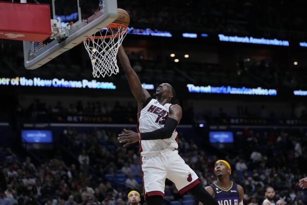 Miami Heat center Bam Adebayo (13) goes to the basket in the second half of an NBA basketball game against the New Orleans Pelicans in New Orleans, Wednesday, Jan. 18, 2023. The Heat won 124-98. (AP Photo/Gerald Herbert)