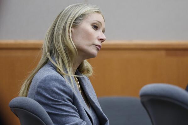 Gwyneth Paltrow sits in court during an objection by her attorney during her trial, Thursday, March 23, 2023, in Park City, Utah, where she is accused in a lawsuit of crashing into a skier during a 2016 family ski vacation, leaving him with brain damage and four broken ribs. Terry Sanderson claims that the actor-turned-lifestyle influencer was cruising down the slopes so recklessly that they violently collided, leaving him on the ground as she and her entourage continued their descent down Deer Valley Resort, a skiers-only mountain known for its groomed runs, après-ski champagne yurts and posh clientele. (AP Photo/Jeff Swinger, Pool)